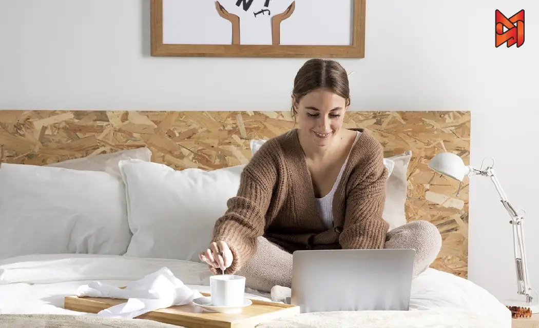 Digital marketer analyzing Airbnb SEO strategies on a laptop.