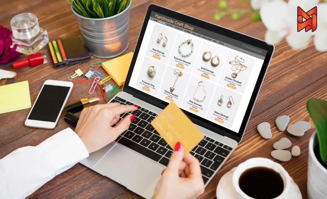 A person browsing a Shopify handmade craft online shop and paying with her credit card.