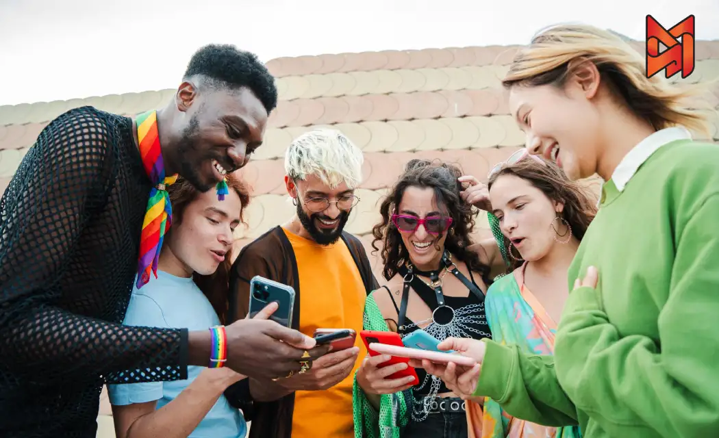 Gen Z friends browsing discount deals on their smartphones for online shopping.