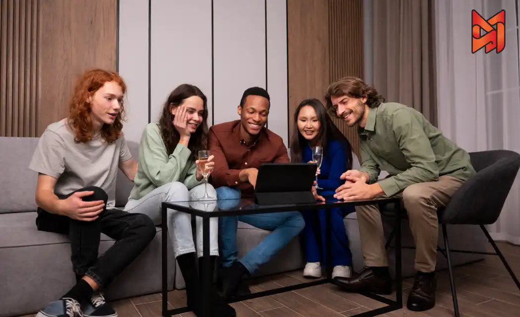 Friends enjoying video content on a popular video platform at home.