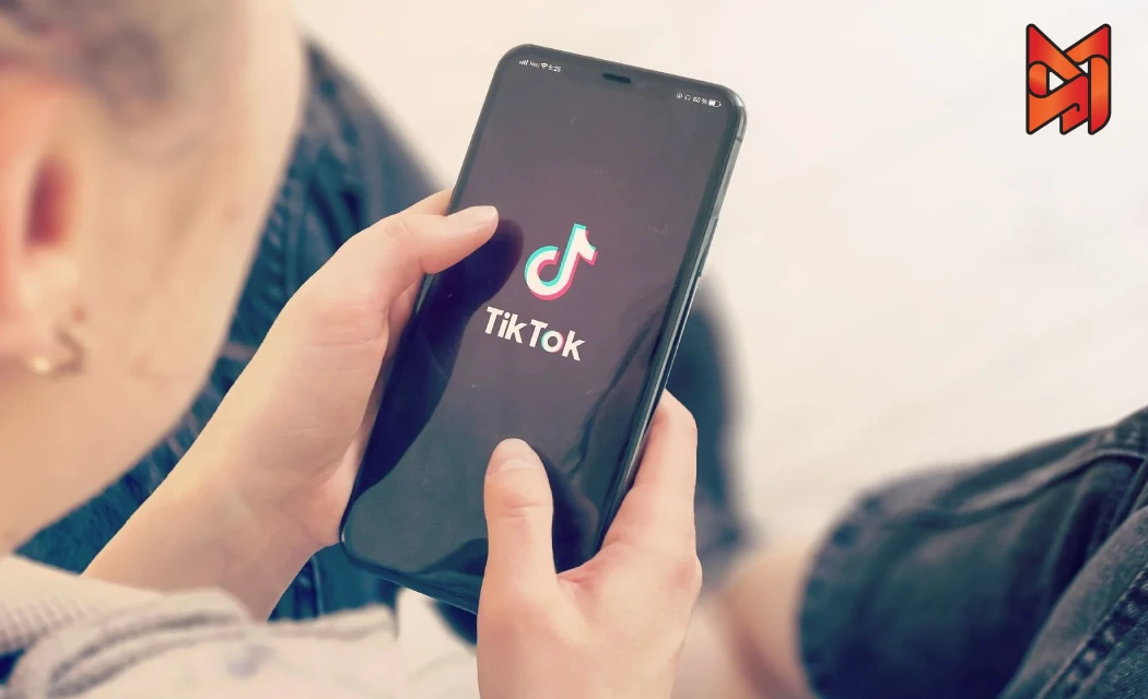 User engaging with TikTok features to publish content.