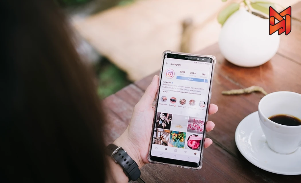 User exploring Instagram posts to select content for reposting.